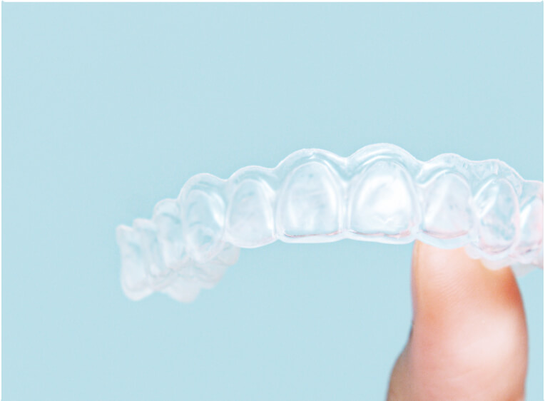 Teeth aligners held in the air